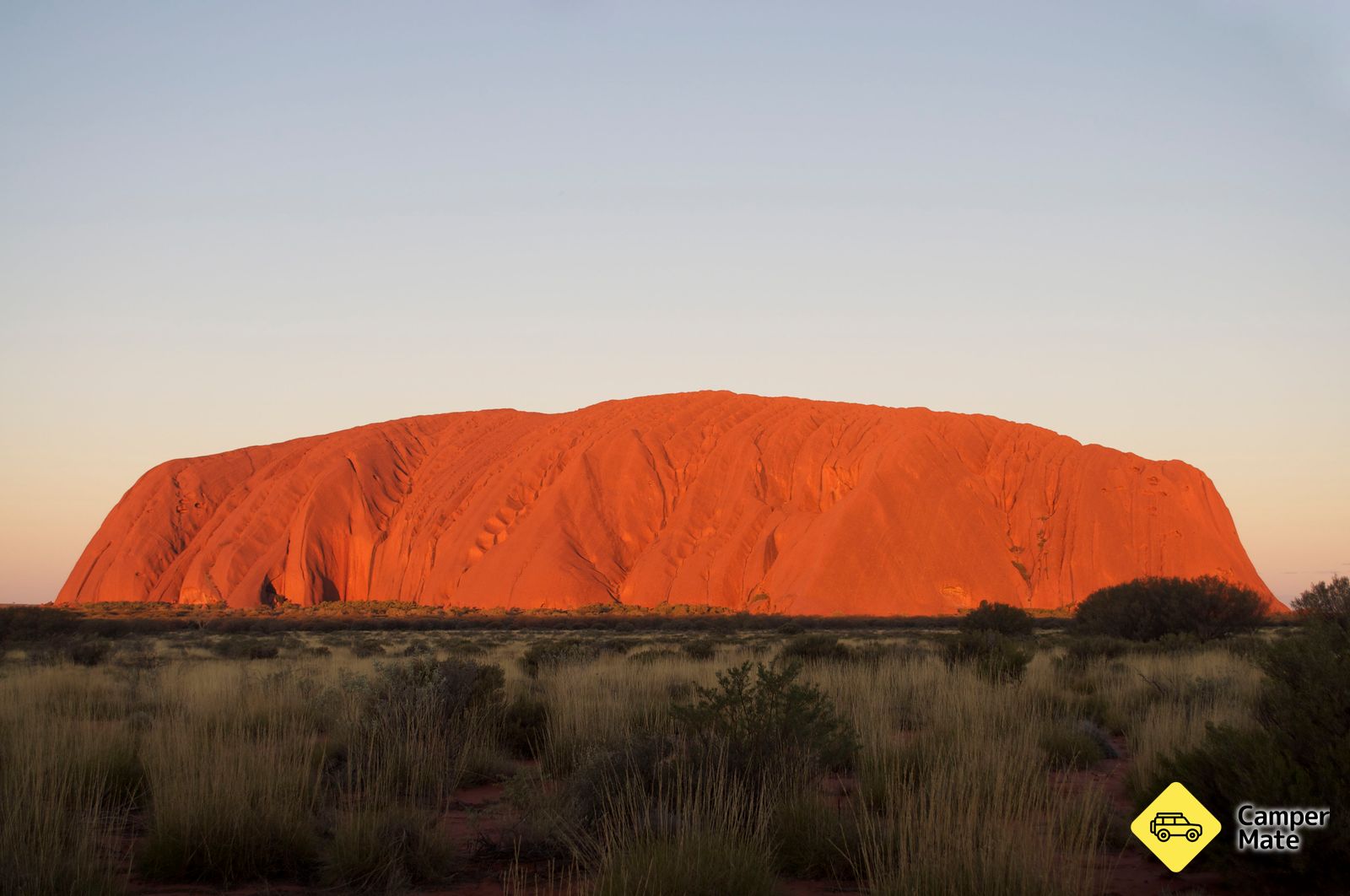 View of Uluru at sunrise from Base Walk